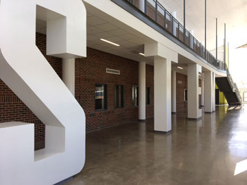 Second-floor supports spell out S-T-E-M in STEM area 