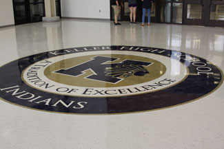 A new Keller High School seal greets visitors on the floor of the new secure entry vestibule. 